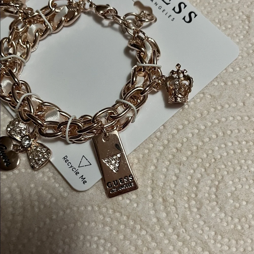 Guess Gold-Tone Charm Bracelet with Sparkling Accents - Picture 3 of 4